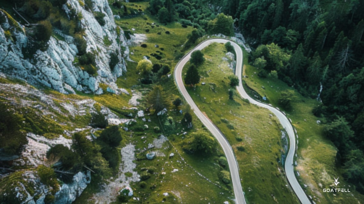 Birdseye view of road in a mountain landscape